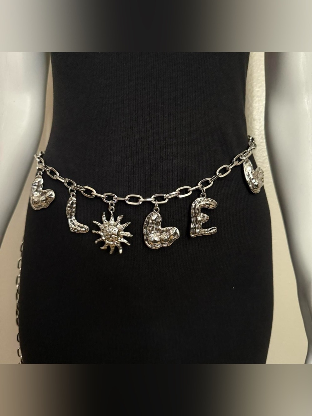 Silver tone metallic charms chain belt
